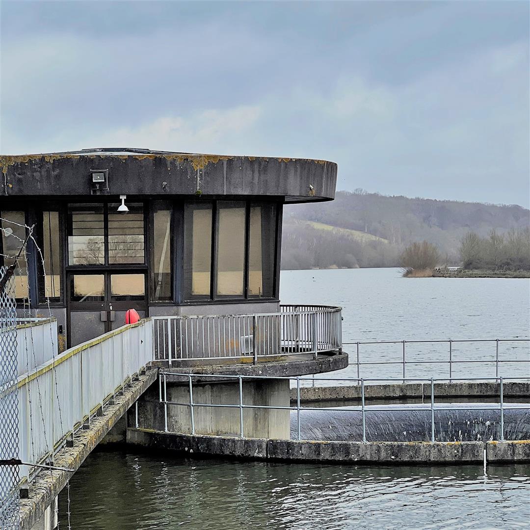 Dam structure and open water at Ardingly Reservoir in February 2022.