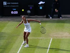 Leylah Fernandez tosses a tennis ball on a grass court at Birmingham in a June 2024 archive photograph.