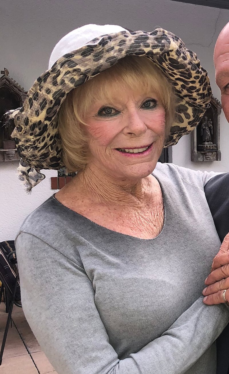 Elke Sommer smiling in a broad patterned hat in an archive portrait photographed on 24 August 2018.
