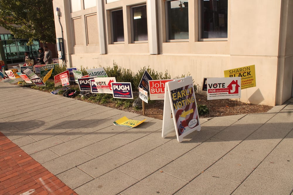 Early-voting and campaign signs outside the UMB Community Engagement Center in Baltimore in October 2016.