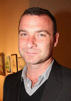 Liev Schreiber in a dark jacket and striped shirt in an archive portrait photographed on 7 October 2009.